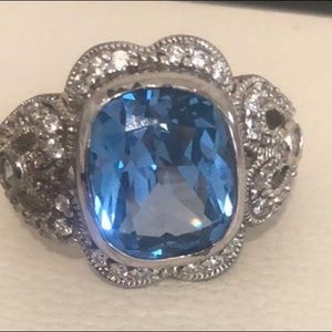 Blue topaz and CZ ring, marked ESPO 925, approximate size 7